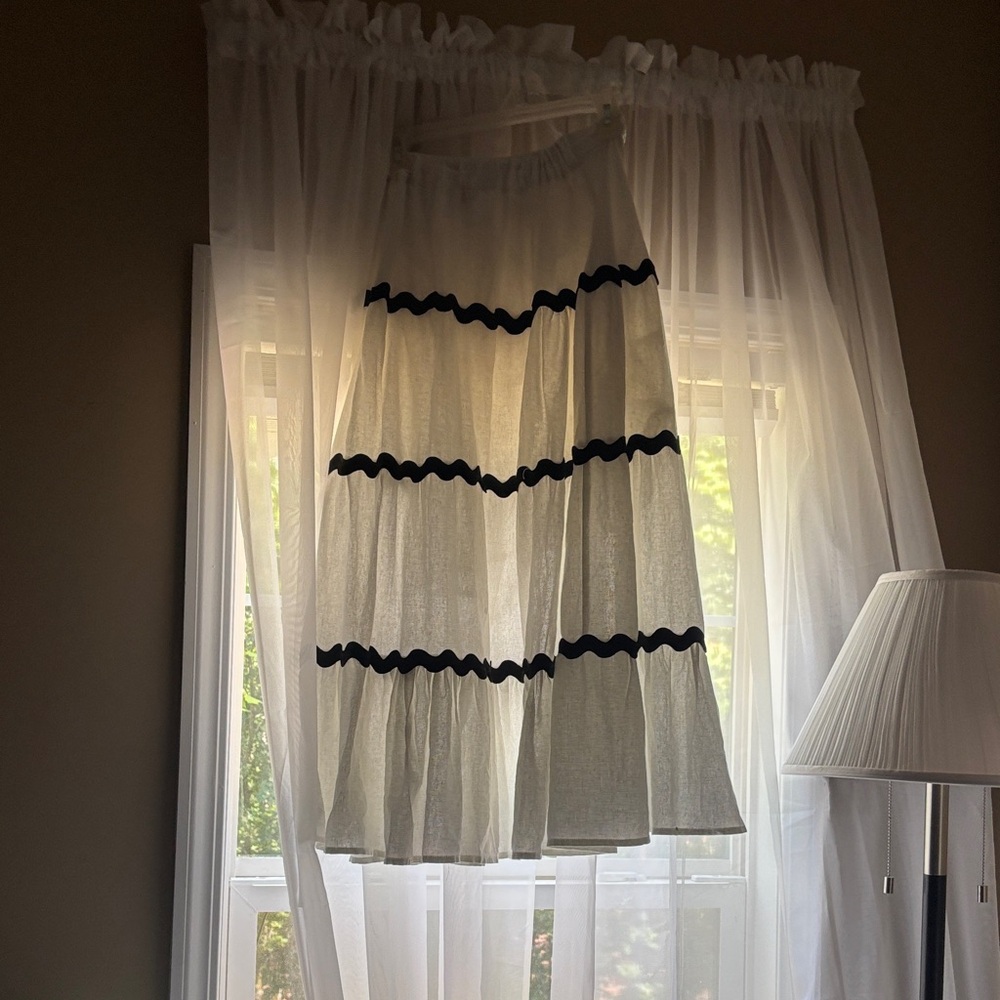 This skirt has never been worn before